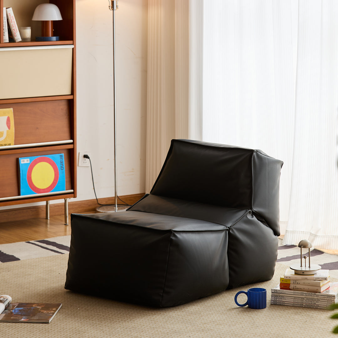 Cream velvet fabric 1 seater sofa lazy in panoramic view.