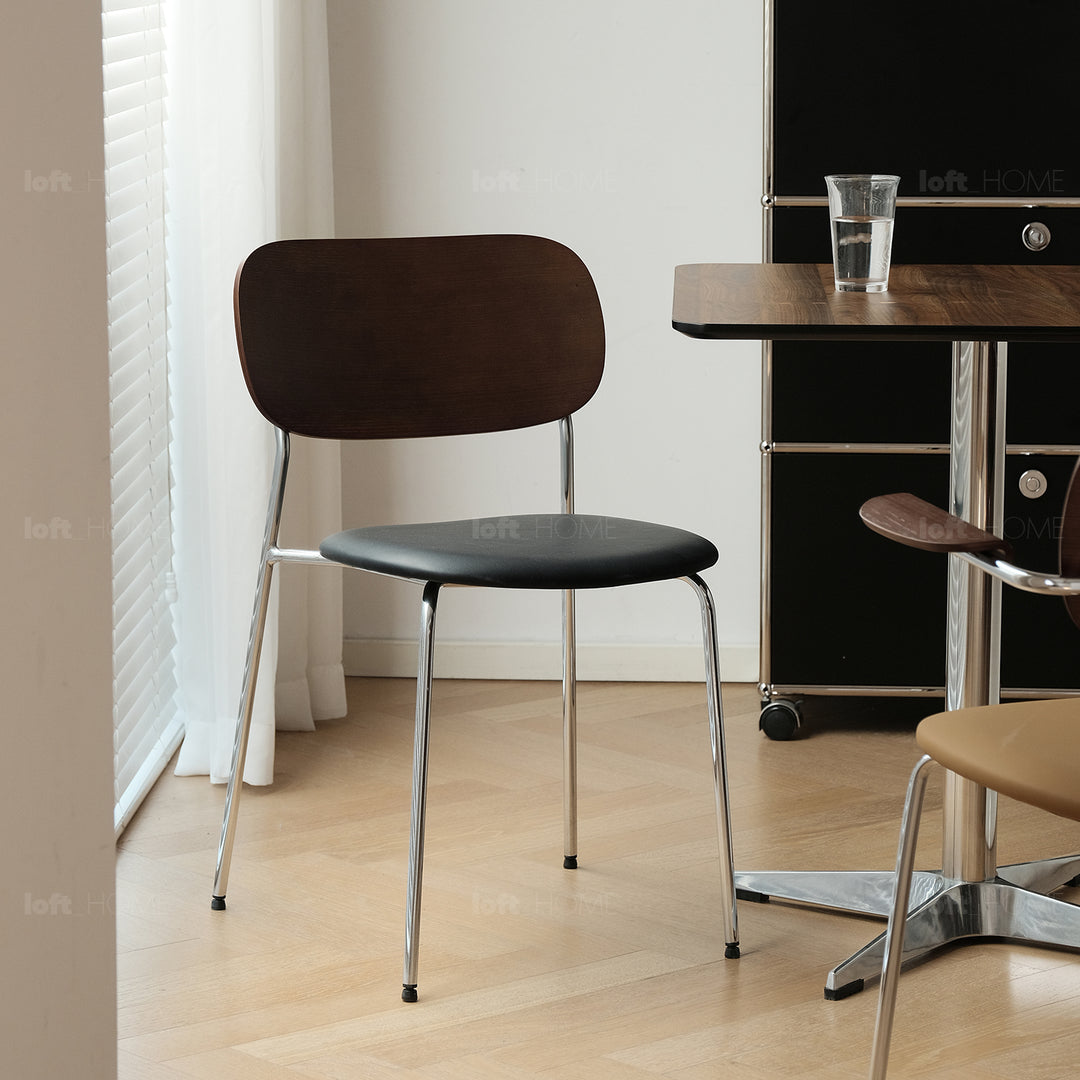 Industrial pu leather dining chair nika in panoramic view.