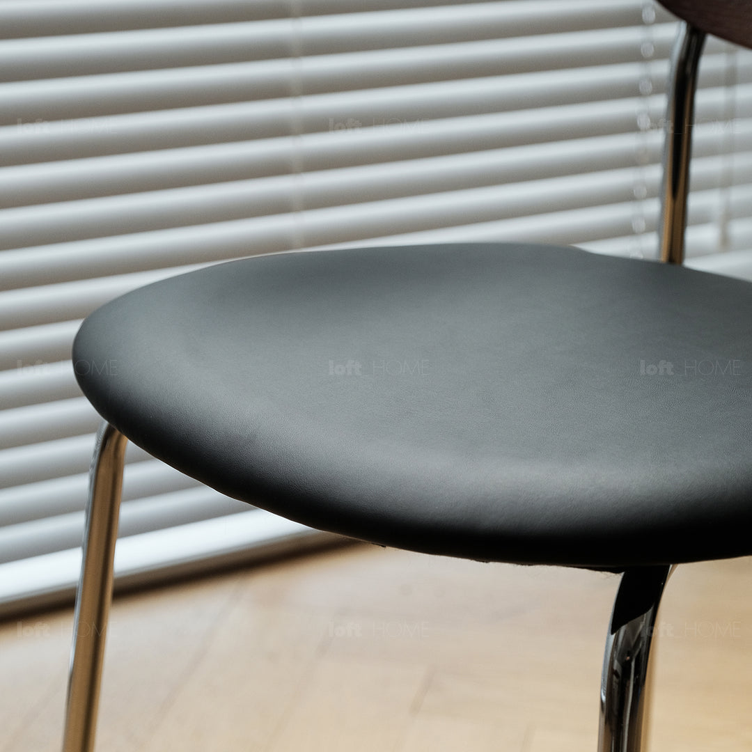 Industrial pu leather dining chair nika in real life style.