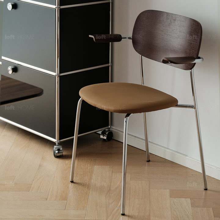 Industrial pu leather dining chair with armrest nika primary product view.