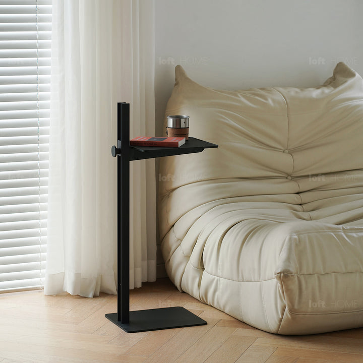 Industrial steel side table string with context.