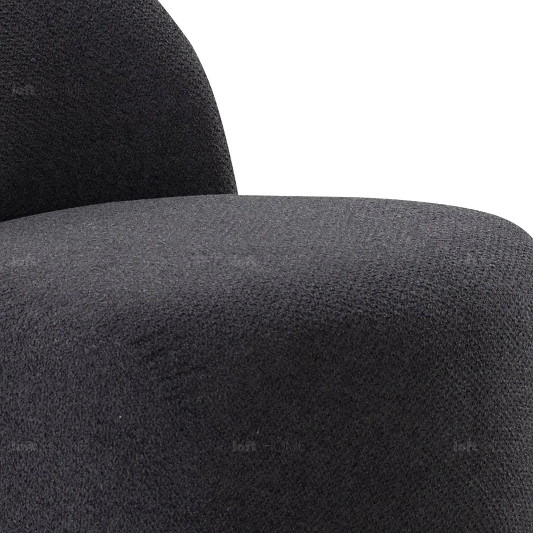 Cream mixed weave fabric revolving 1 seater sofa apse with context.