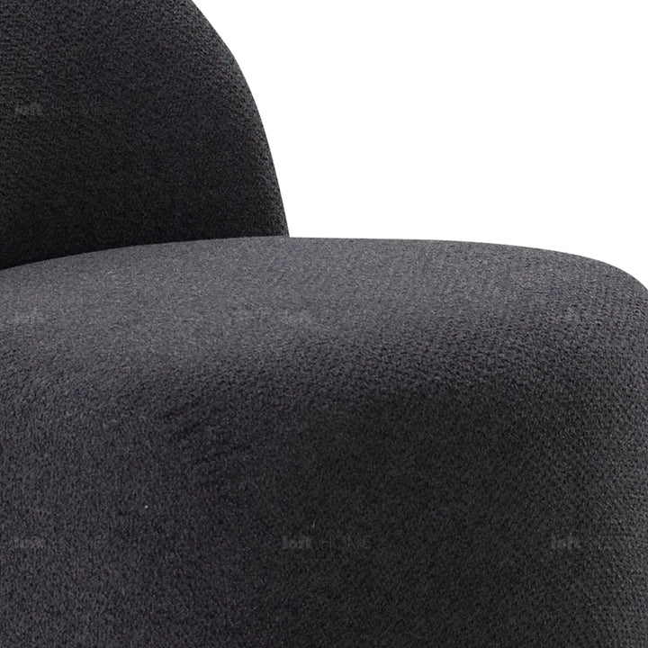 Cream mixed weave fabric revolving 1 seater sofa apse with context.