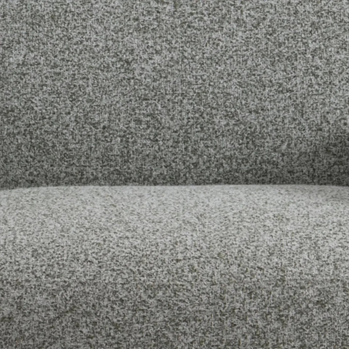 Cream mixed weave fabric revolving 1 seater sofa parapet in panoramic view.