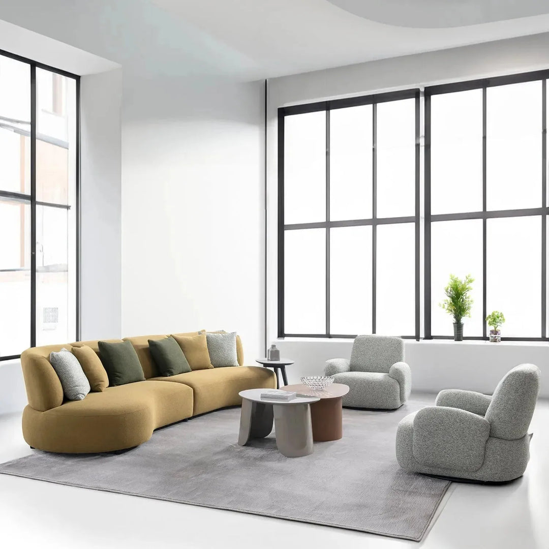 Cream mixed weave fabric revolving 1 seater sofa parapet with context.