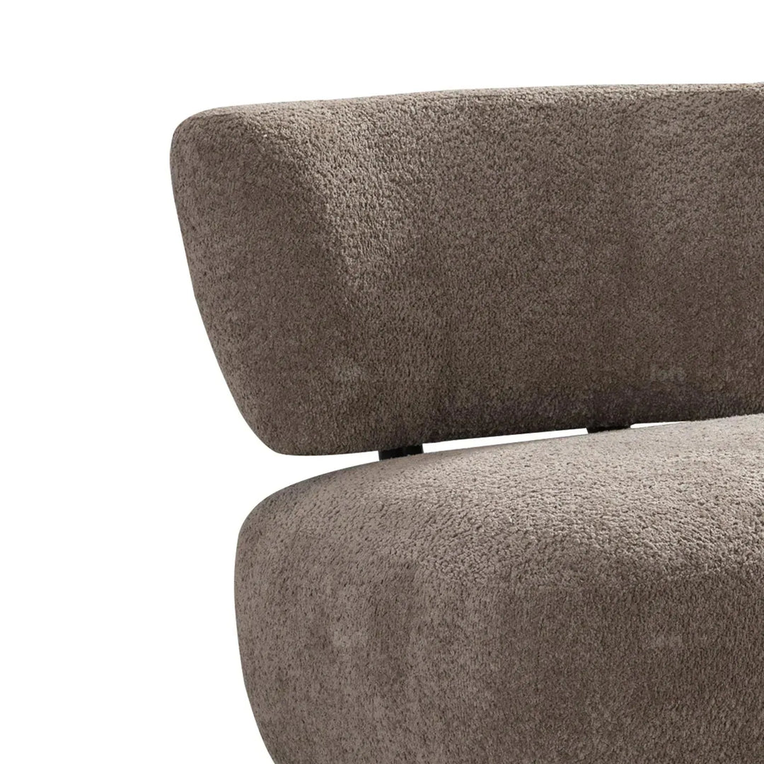 Cream sherpa fabric revolving 1 seater sofa rite in real life style.