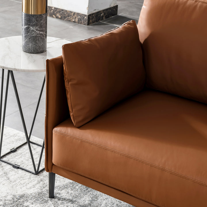 Minimalist genuine leather 1 seater sofa dante in panoramic view.