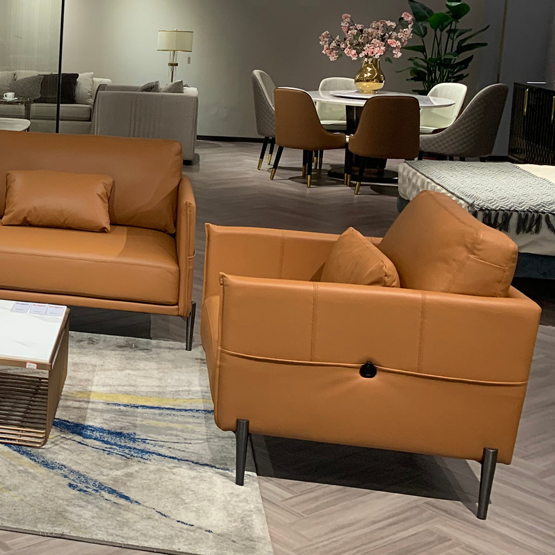 Minimalist genuine leather 1 seater sofa dante with context.