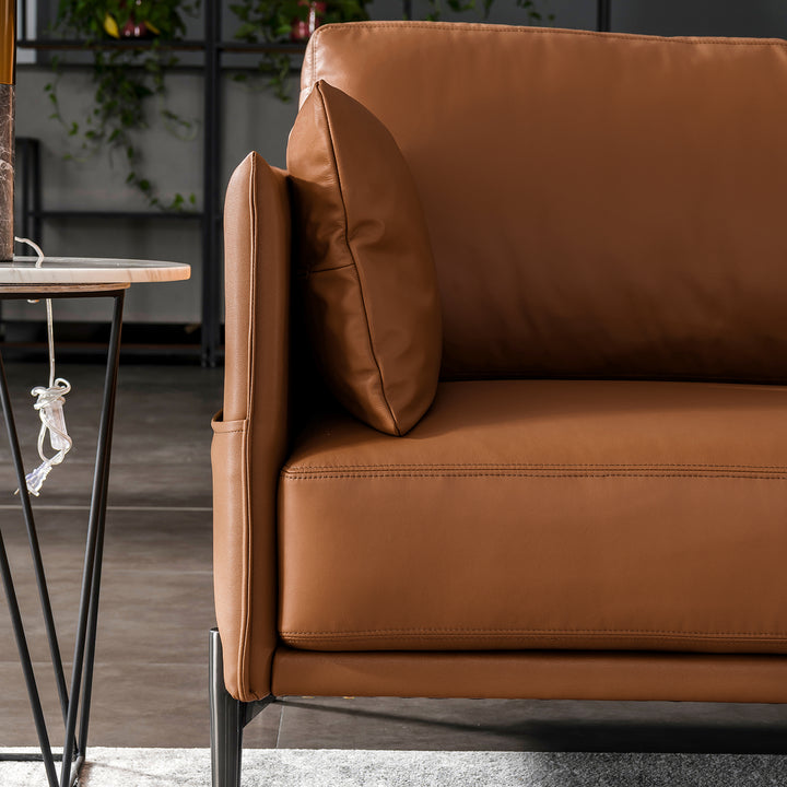 Minimalist genuine leather 1 seater sofa dante in close up details.