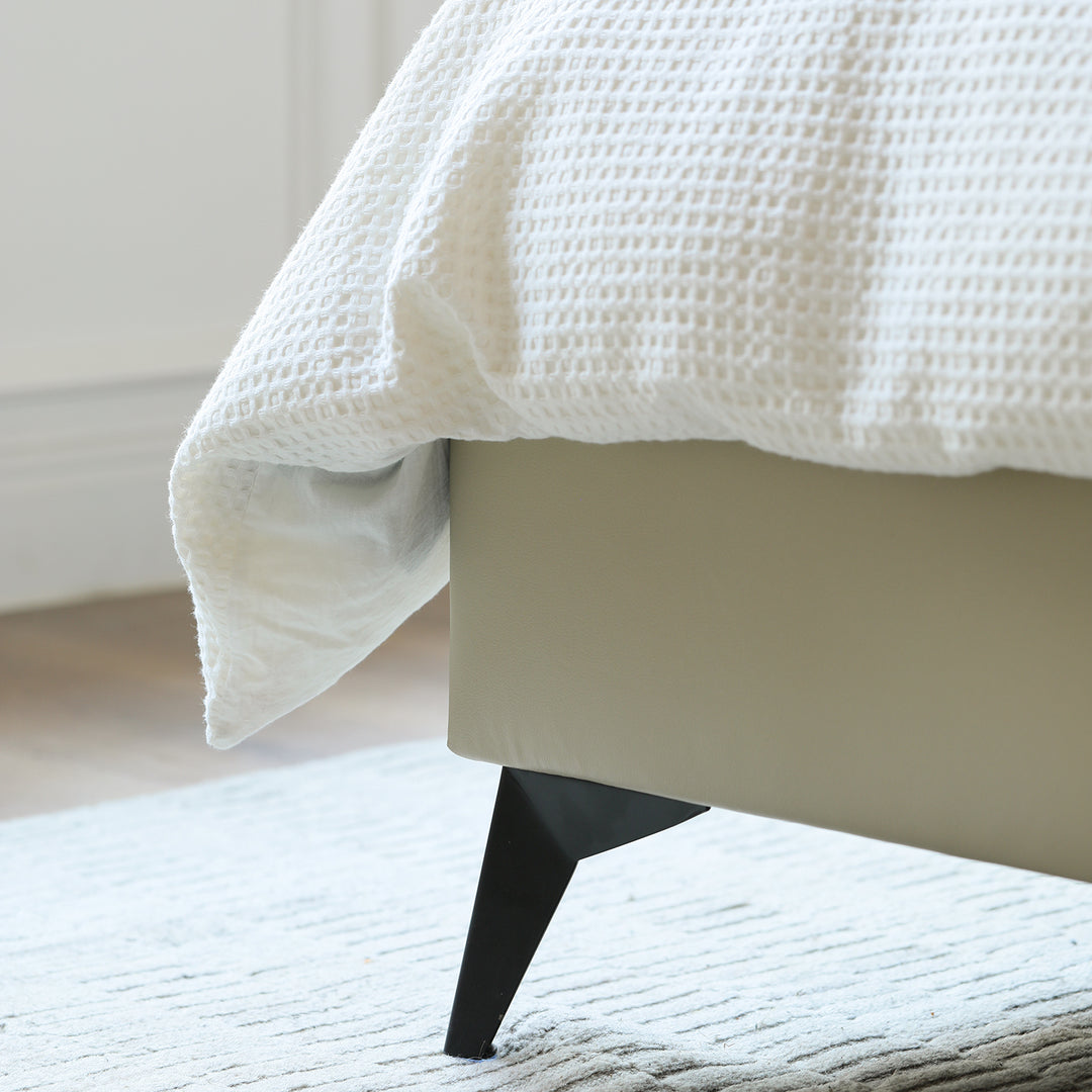 Modern genuine leather bed frame dusko in panoramic view.