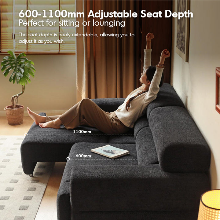 Cream boucle fabric electric functional 4 seater sofa bed sleepo in still life.