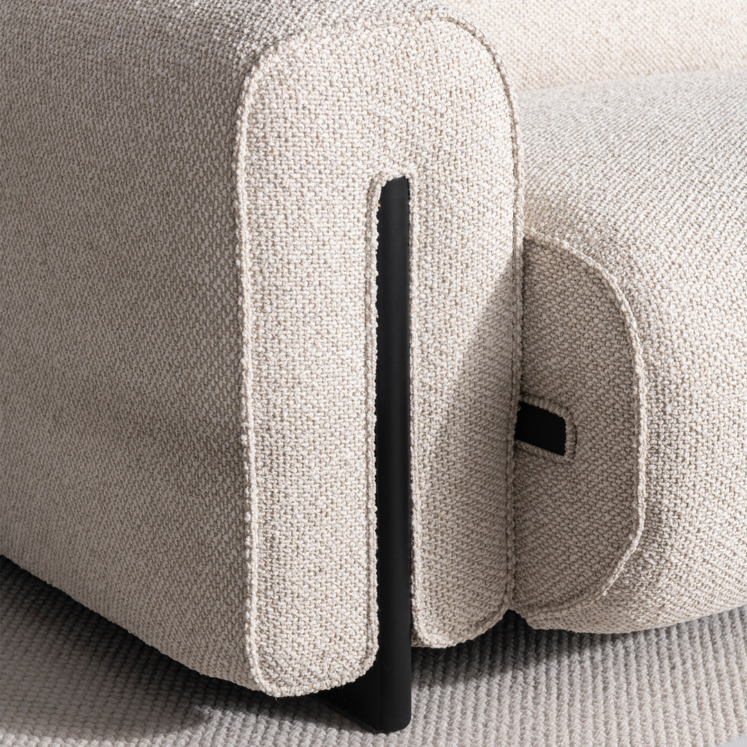 Minimalist boucle fabric modular 3 seater sofa colle in still life.