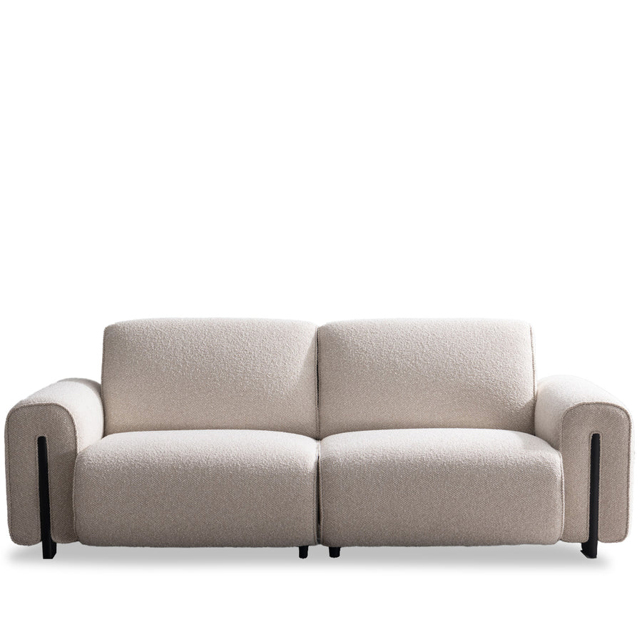 Minimalist boucle fabric modular 3 seater sofa colle in white background.