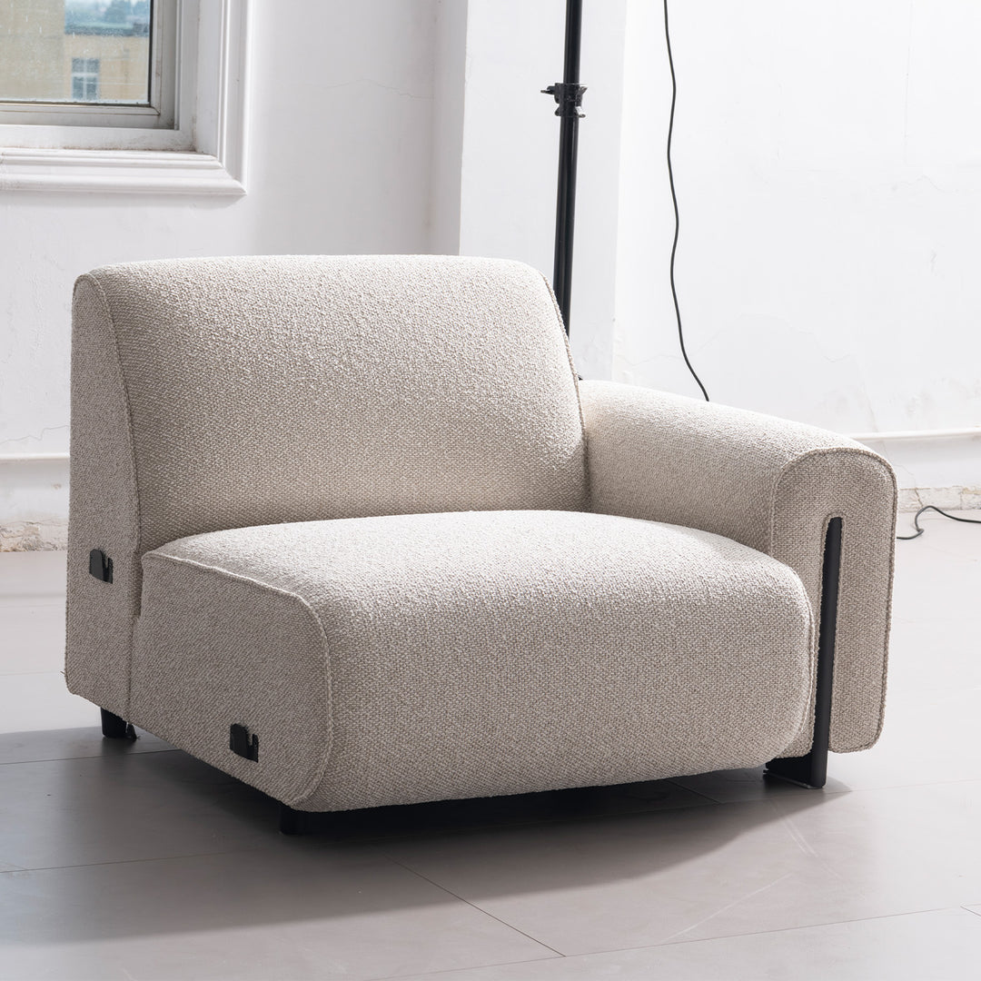 Minimalist boucle fabric modular 4 seater sofa colle in panoramic view.