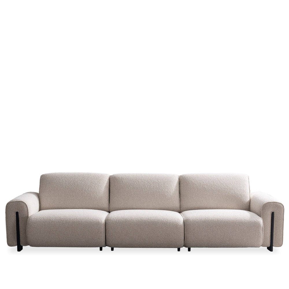 Minimalist boucle fabric modular 4 seater sofa colle in white background.