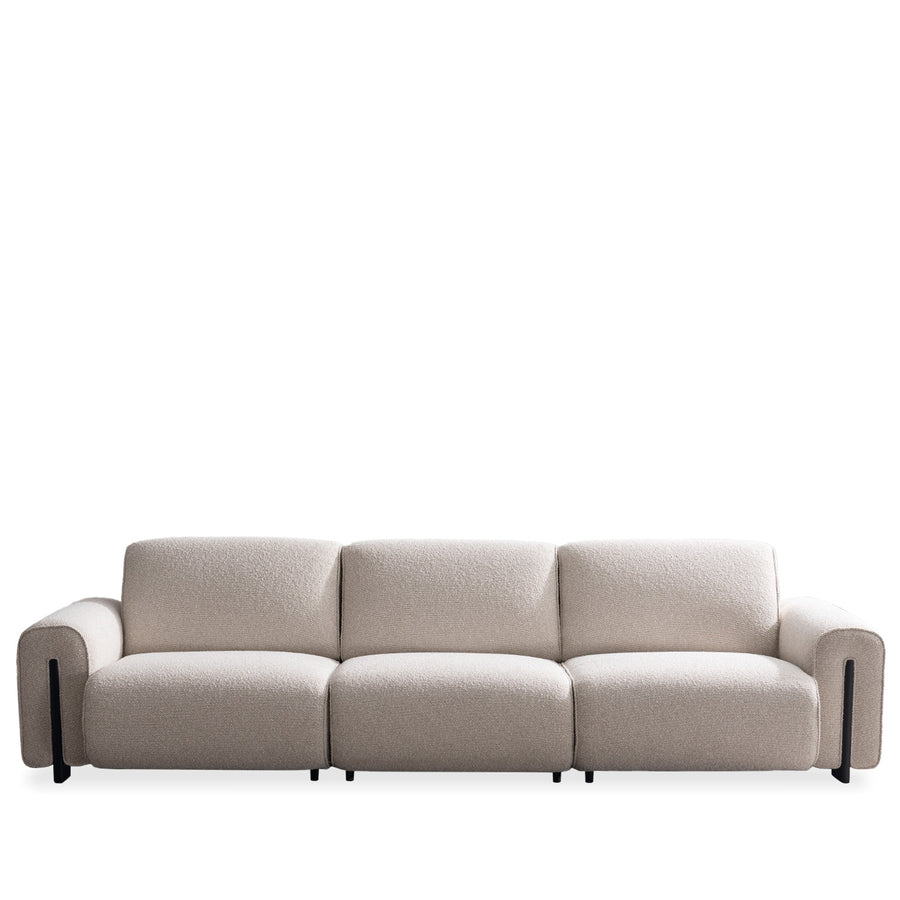 Minimalist boucle fabric modular 4 seater sofa colle in white background.