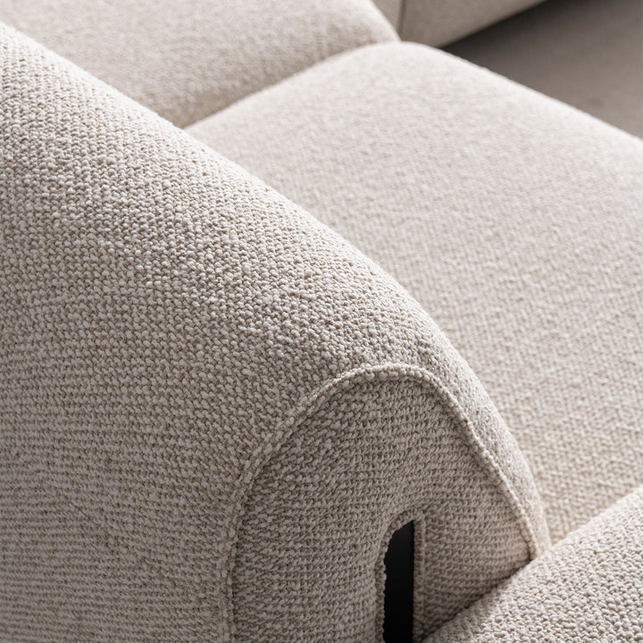 Minimalist boucle fabric modular l shape sectional sofa colle 3+l in close up details.