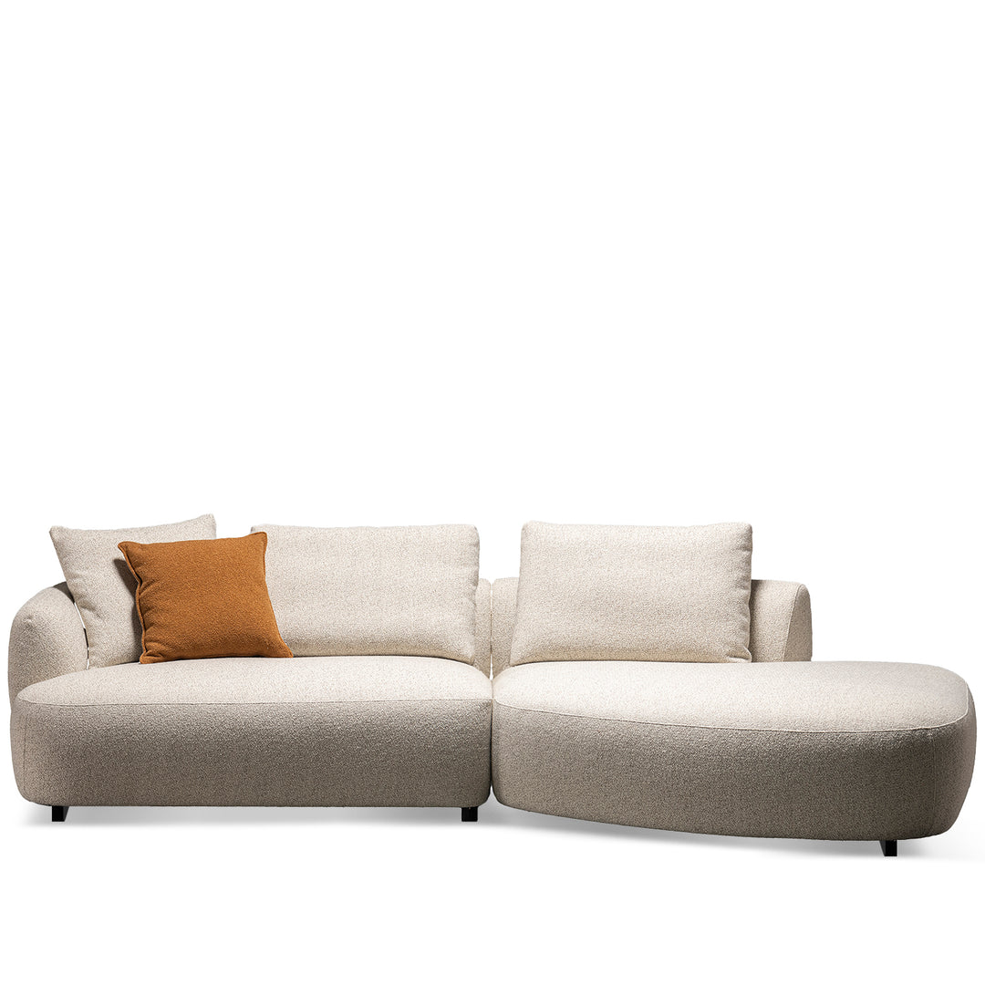 Cream boucle fabric modular l shape sectional sofa serene 2+l in white background.