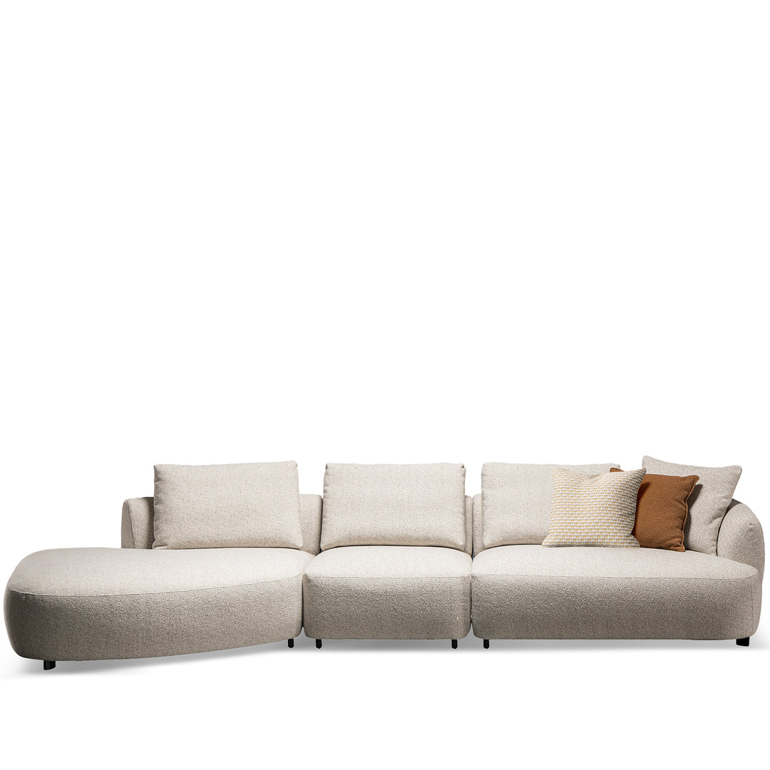 Cream boucle fabric modular l shape sectional sofa serene 3+l in white background.