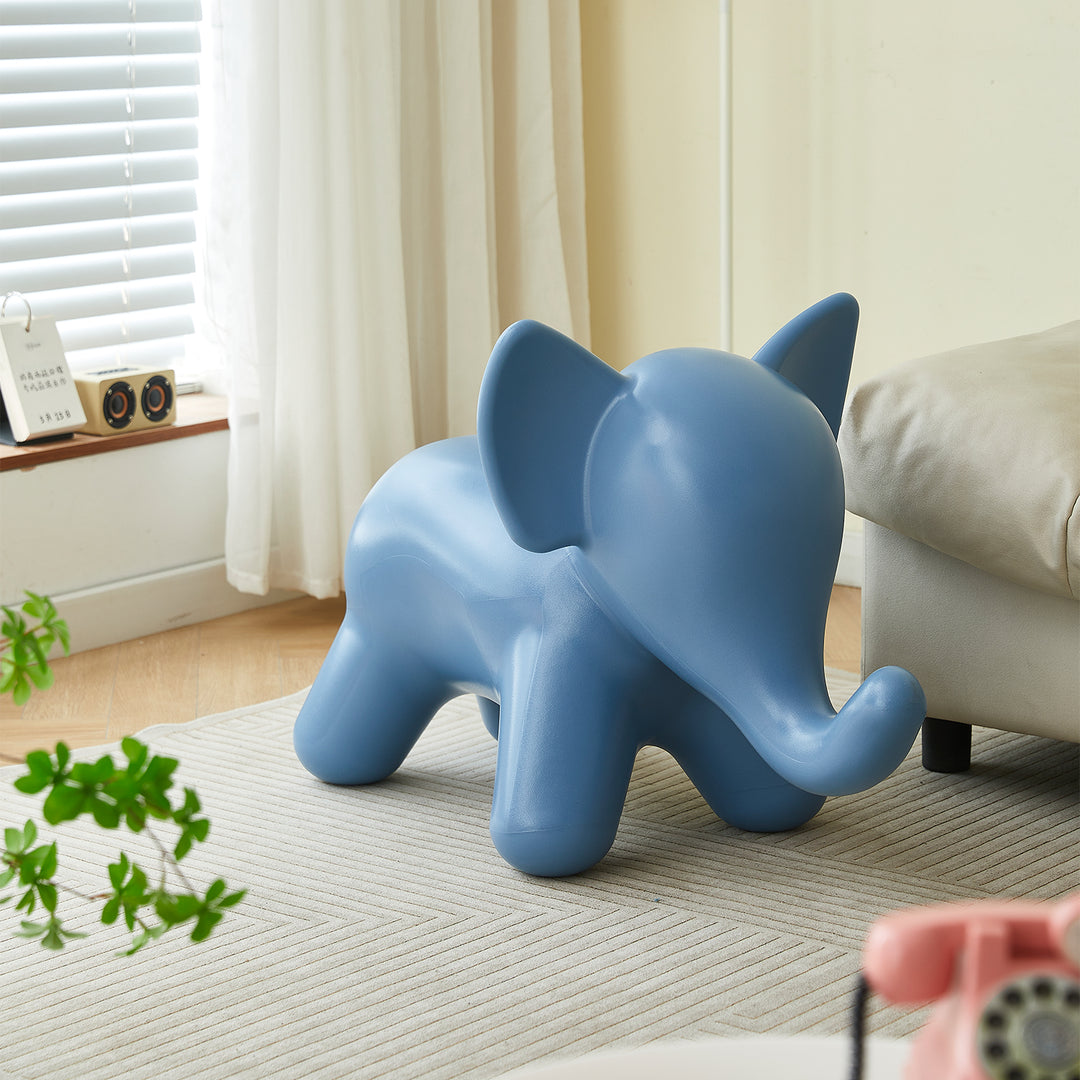 Contemporary plastic ottoman elephant in still life.