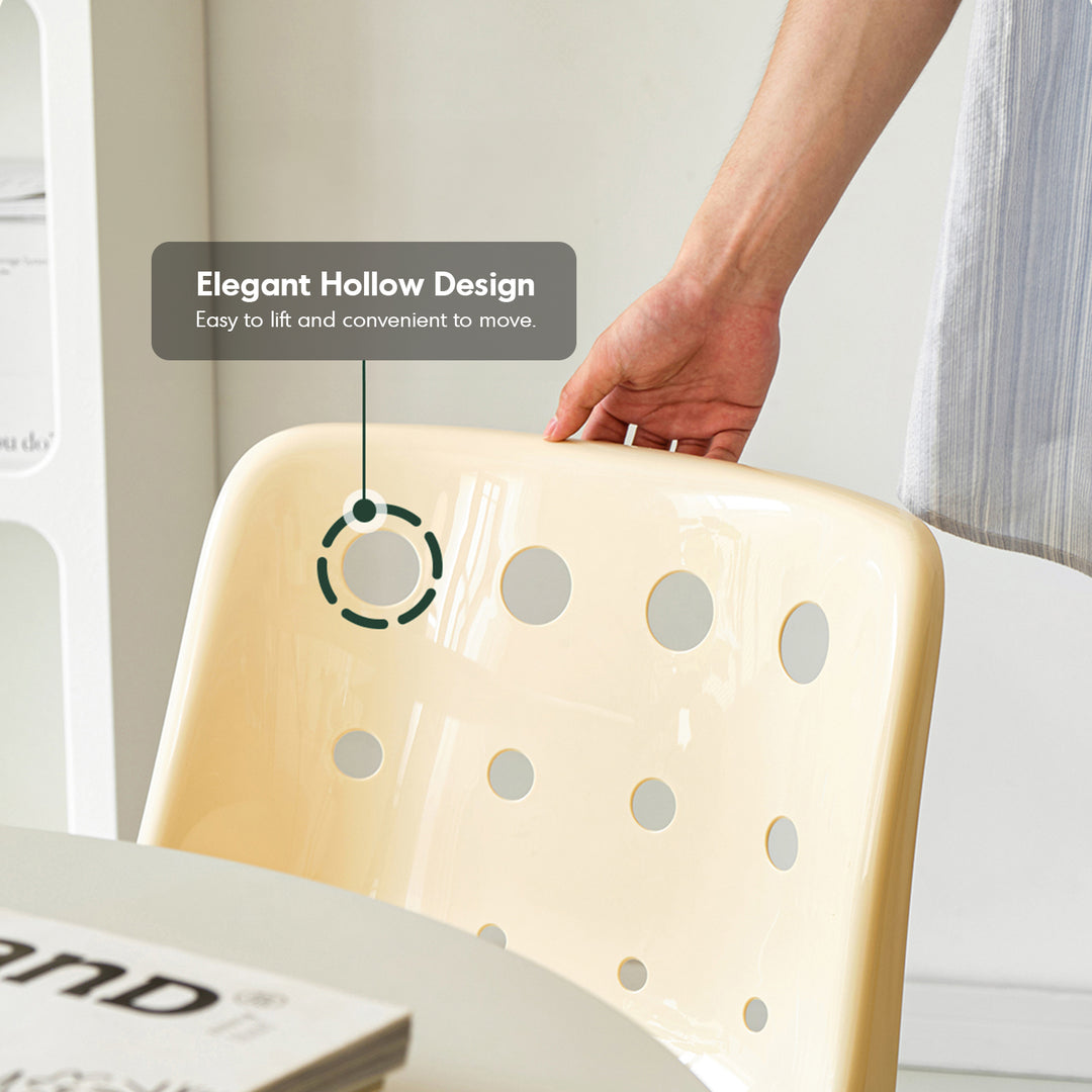 Contemporary plastic dining chair polo in panoramic view.