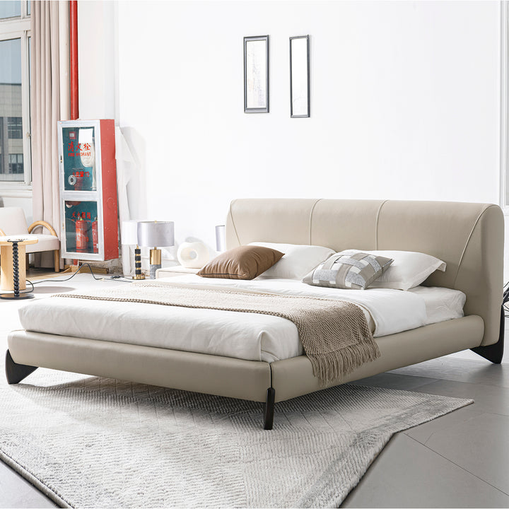 Modern genuine leather bed frame arcy in still life.