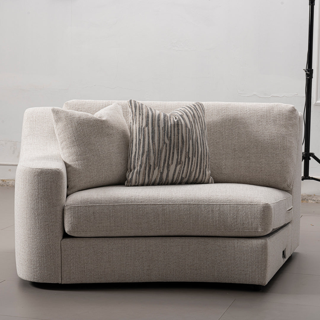 Modern mixed weave fabric modular corner 2 seater sofa terra in panoramic view.