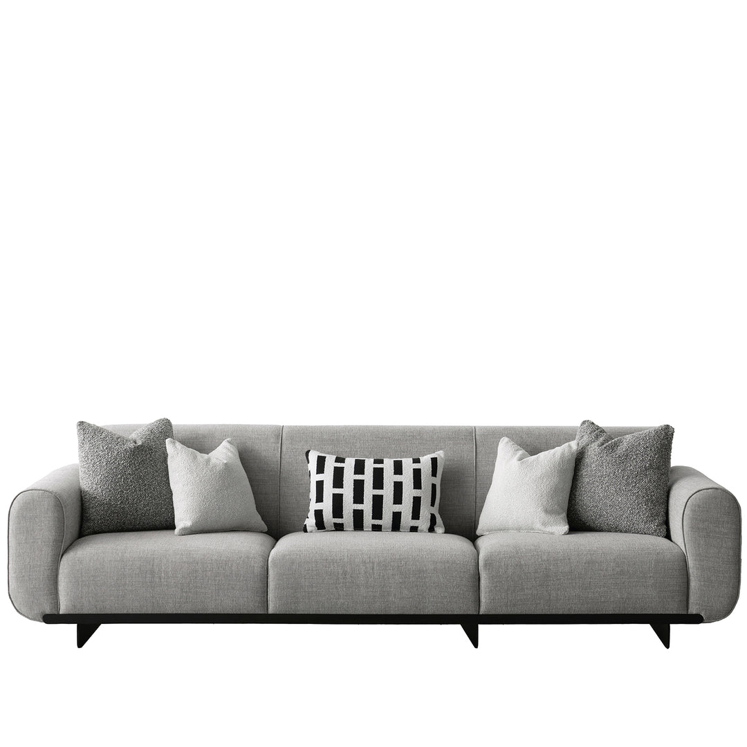 Modern mixed weave fabric sectional 4 seater sofa griddy in white background.