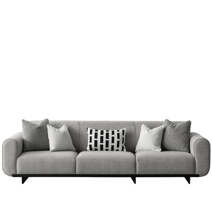 Modern mixed weave fabric sectional 4 seater sofa griddy in white background.