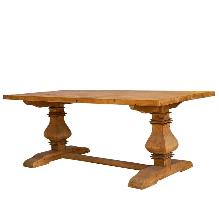 Rustic elm wood dining table lantern with context.