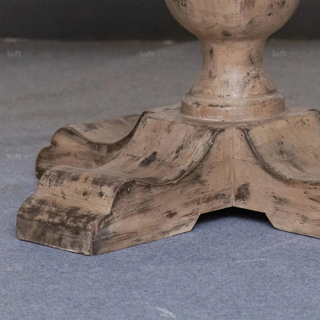 Rustic pine wood round dining table willow in panoramic view.