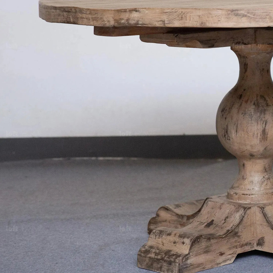 Rustic pine wood round dining table willow in close up details.