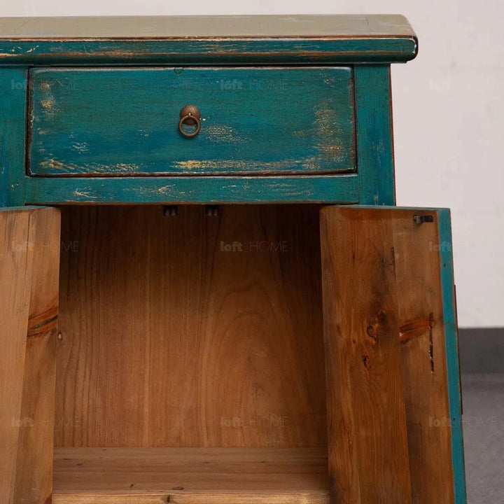 Rustic pine wood storage cabinet heirloom in close up details.