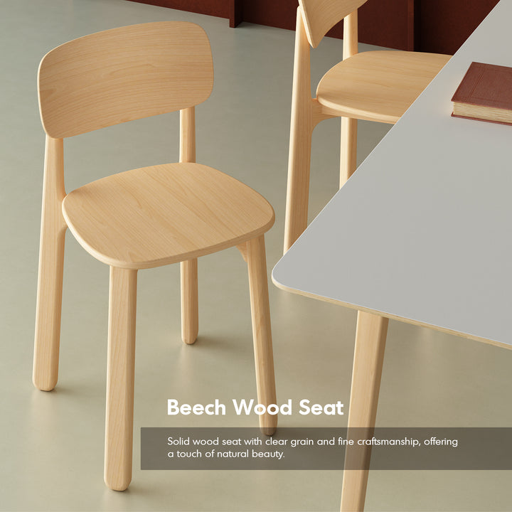 Scandinavian beech wood dining chair poppy in still life.