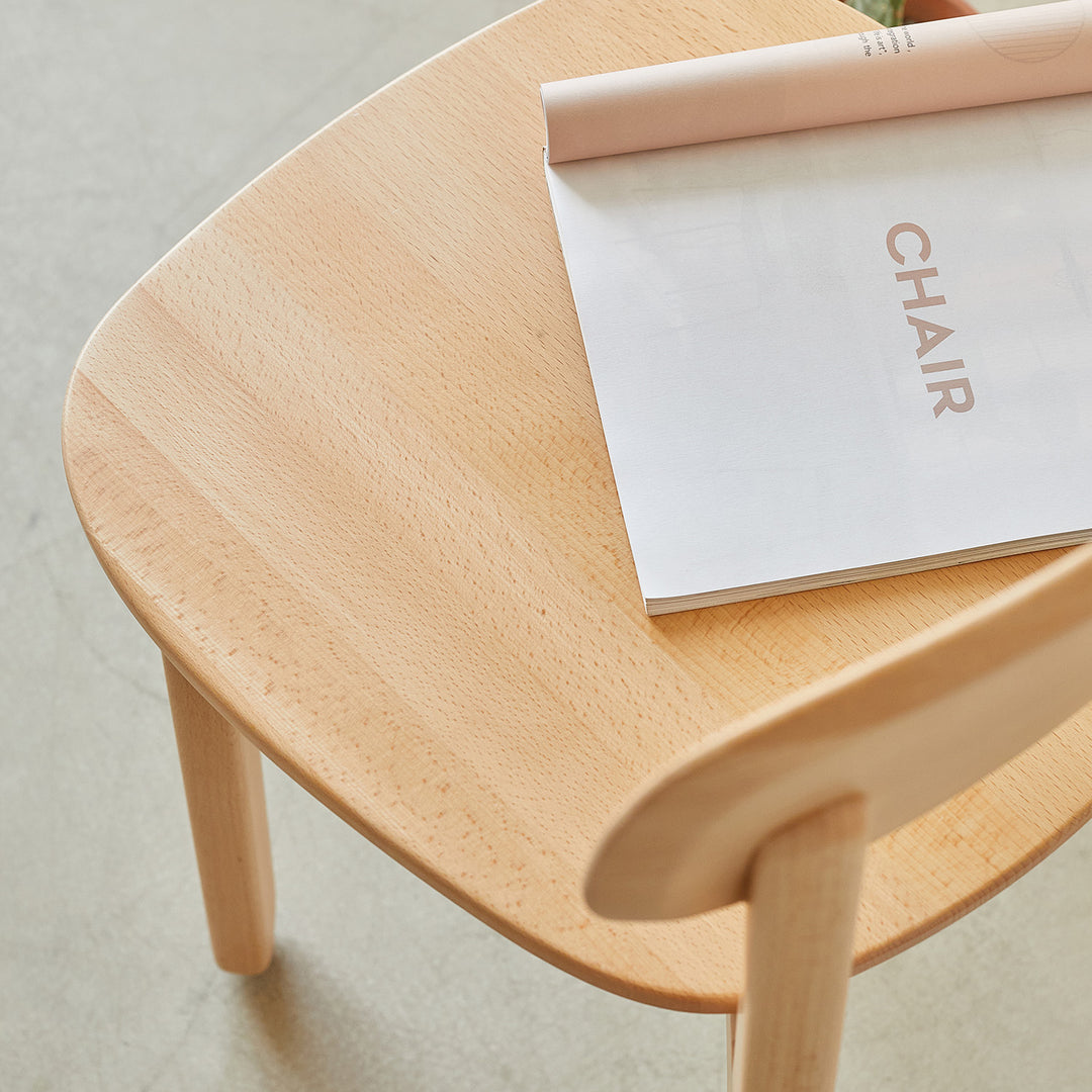Scandinavian beech wood dining chair poppy situational feels.