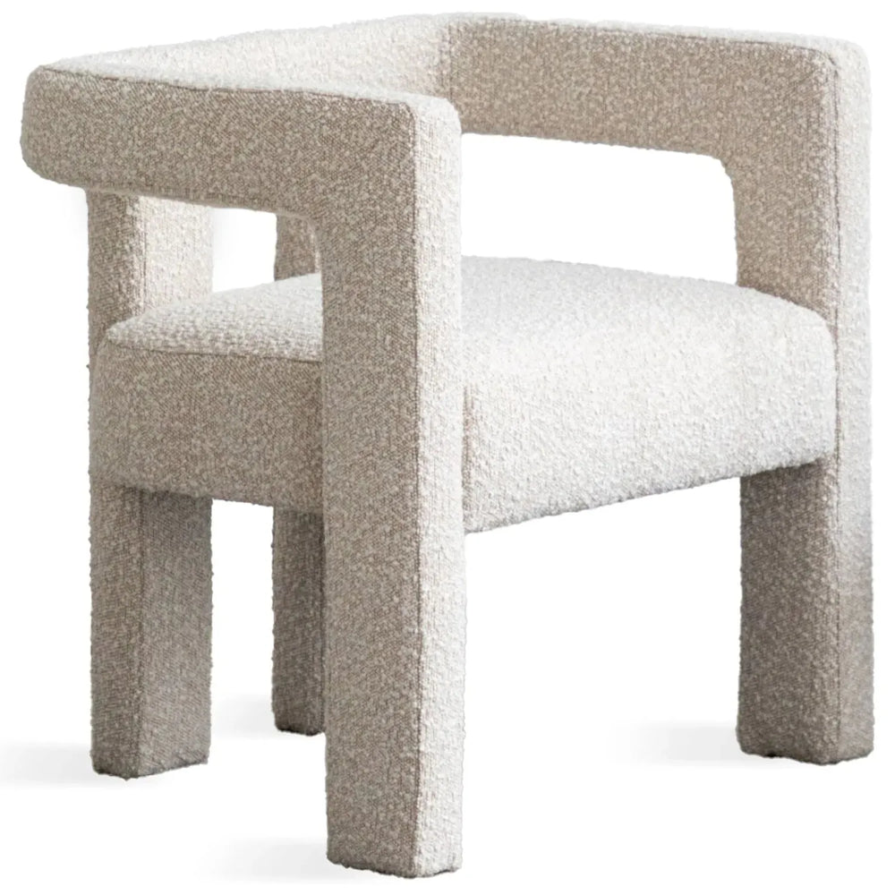 Cream boucle fabric dining chair whim in white background.