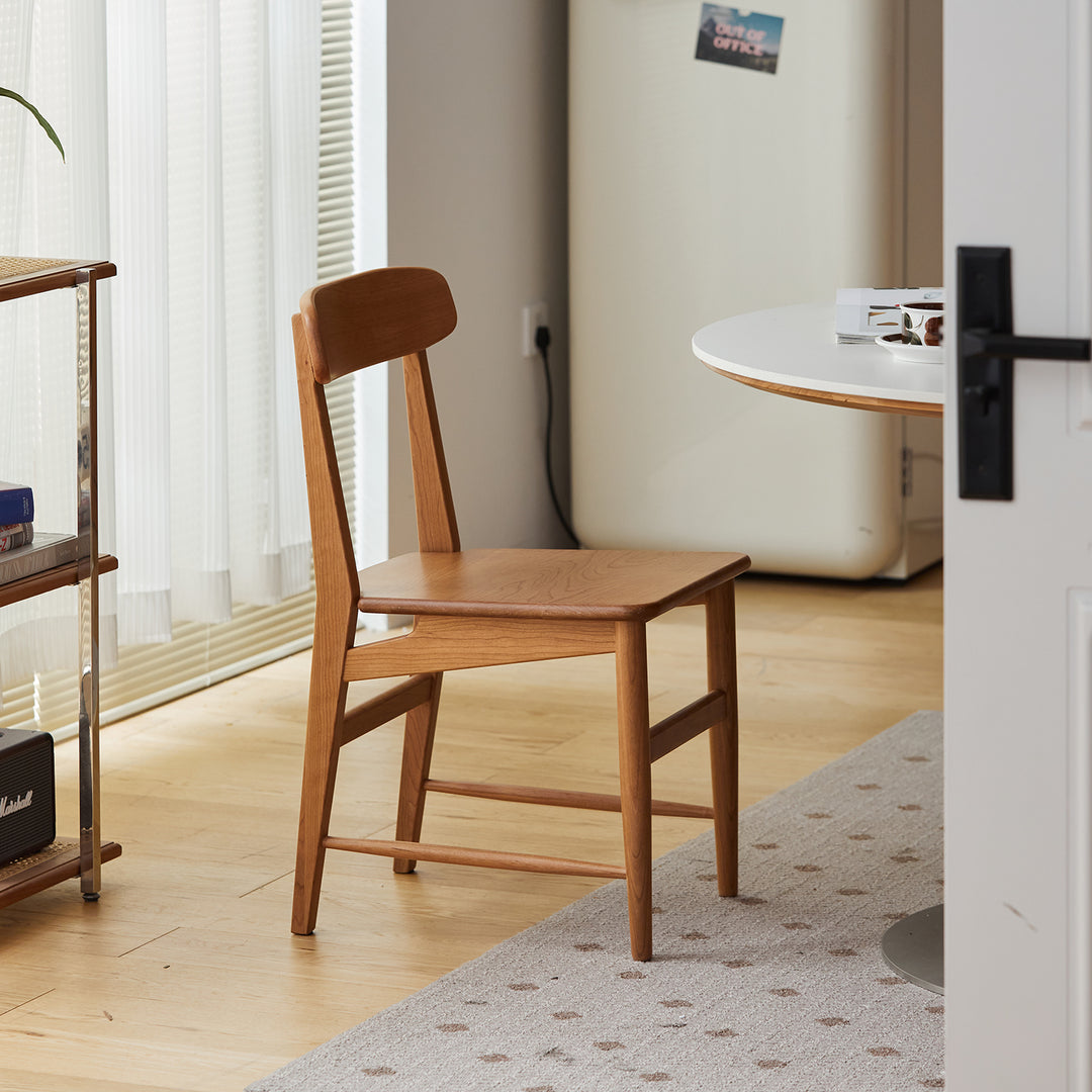 Scandinavian cherry wood dining chair modo with context.