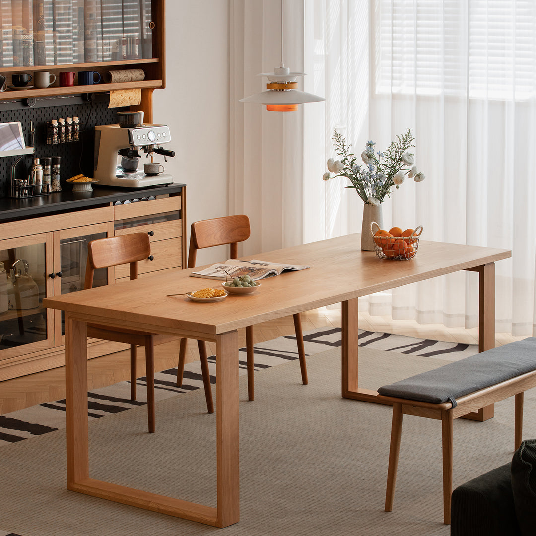 Scandinavian cherry wood dining table blue whale primary product view.