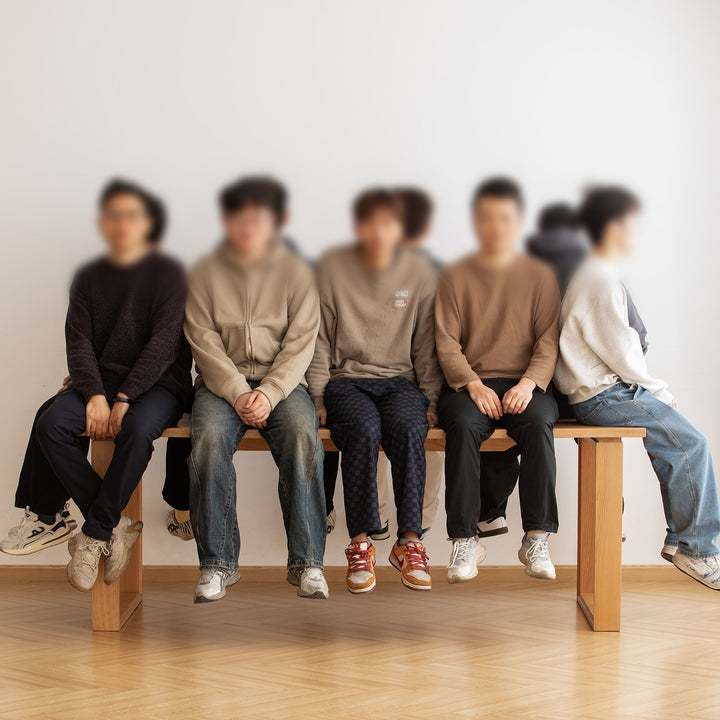 Scandinavian cherry wood dining table blue whale in still life.