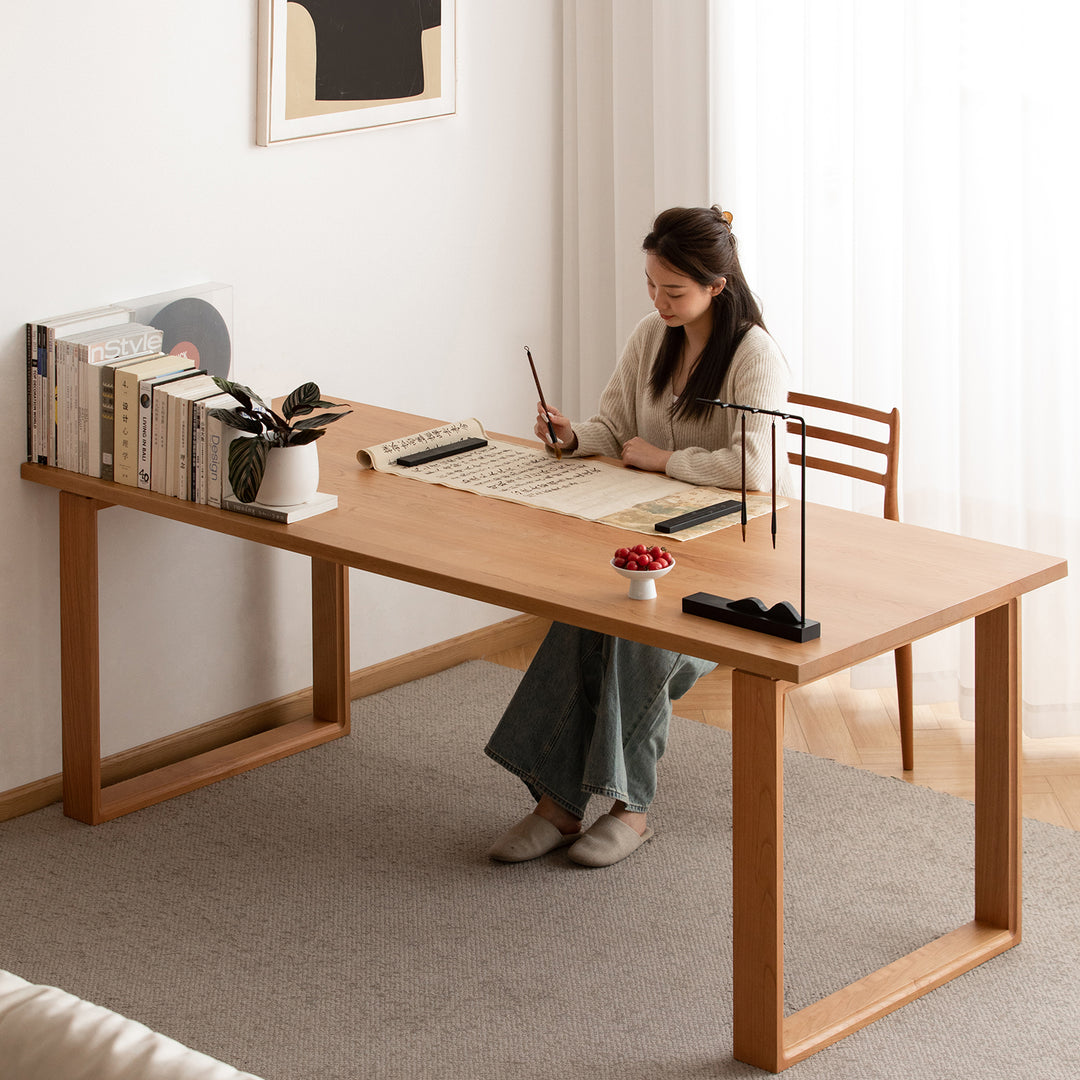 Scandinavian cherry wood dining table blue whale color swatches.