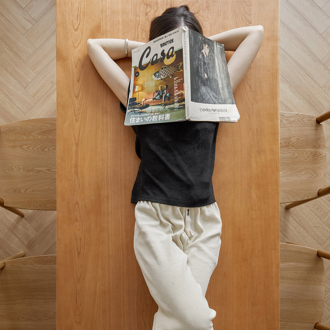 Scandinavian cherry wood dining table blue whale in real life style.