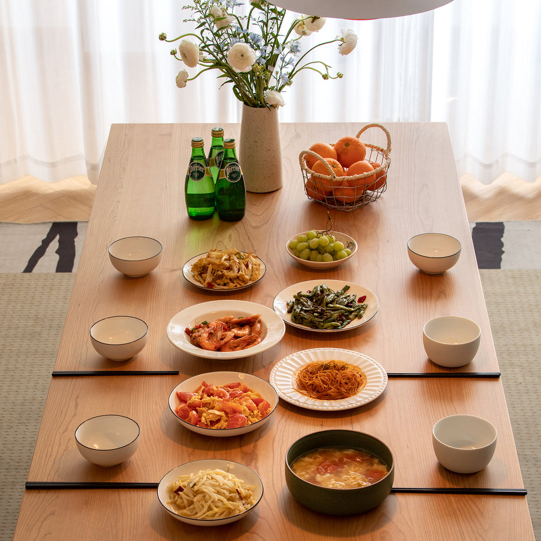 Scandinavian cherry wood dining table blue whale in details.