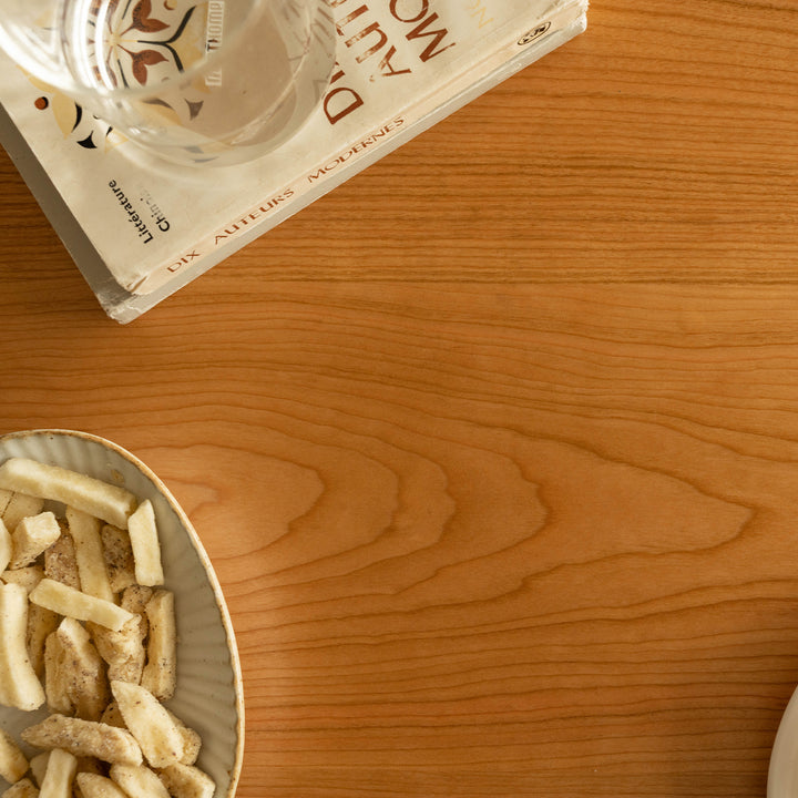 Scandinavian cherry wood dining table green color swatches.