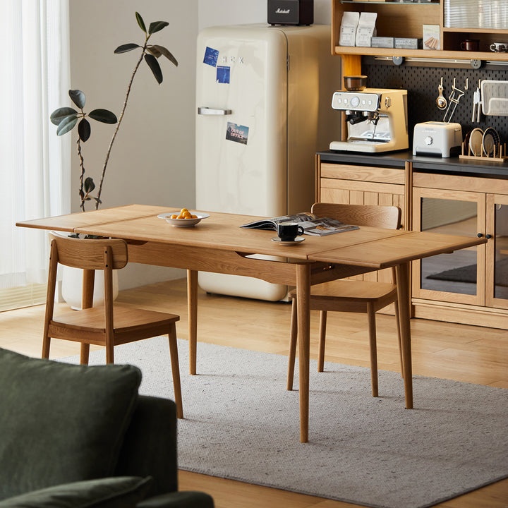 Scandinavian cherry wood extendable dining table mcgee primary product view.