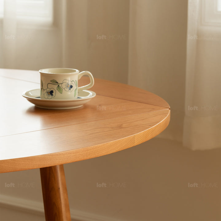 Scandinavian cherry wood extendable round dining table greekn conceptual design.