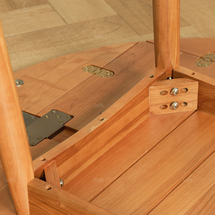 Scandinavian cherry wood extendable round dining table greekn situational feels.