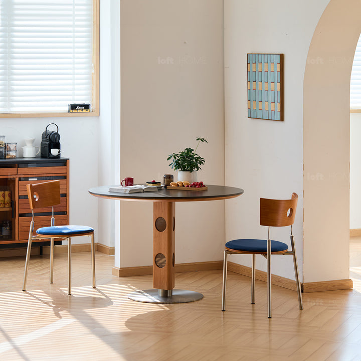 Scandinavian cherry wood mix weave fabric dining chair timeless in details.