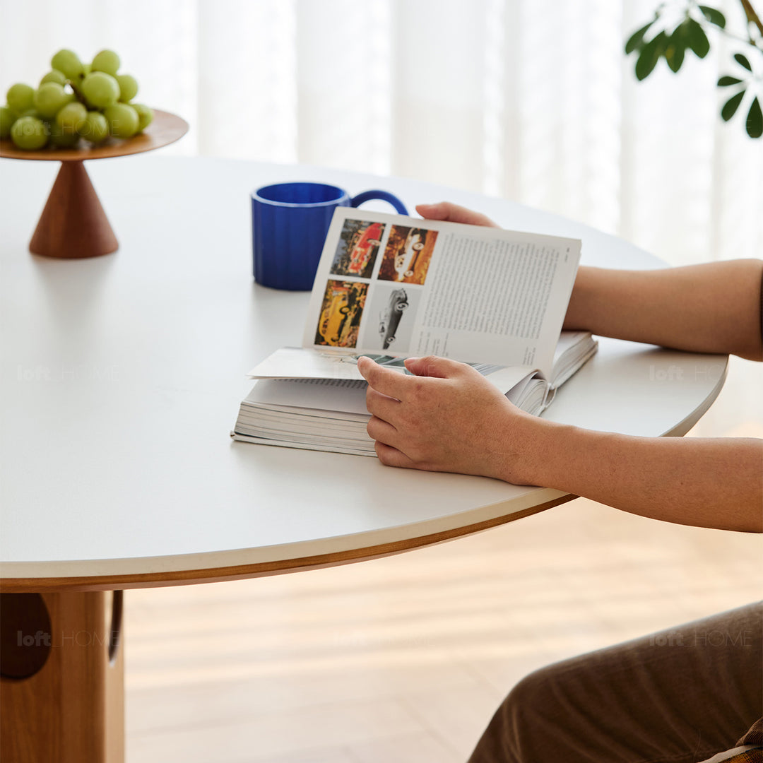 Scandinavian cherry wood sintered stone round dining table timeless detail 1.
