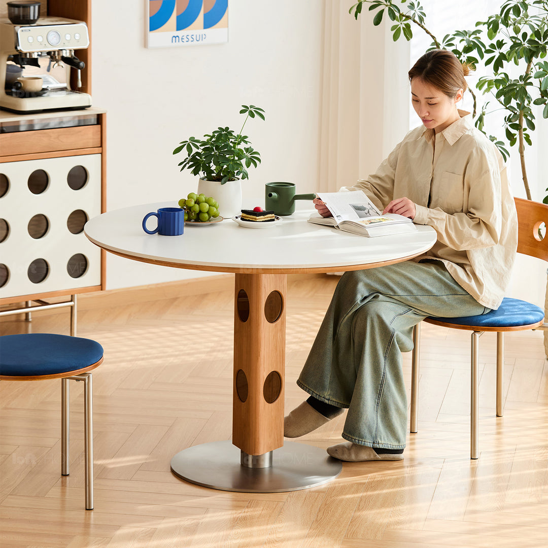 Scandinavian cherry wood sintered stone round dining table timeless in real life style.