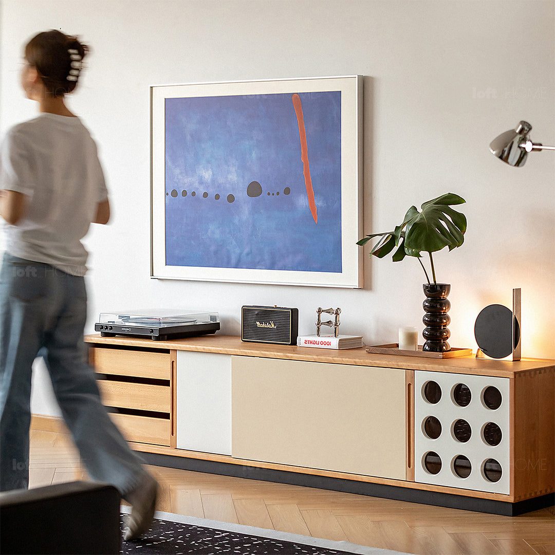Scandinavian cherry wood sliding door tv console timeless in still life.